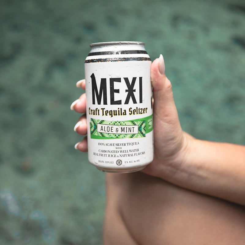 Holding a Can of Aloe Mint Mexi Seltzer
