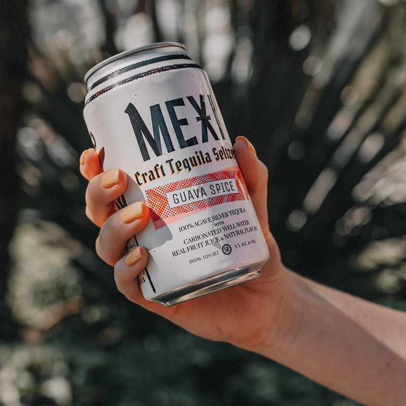 Holding a Can of Guava Spice Mexi Seltzer